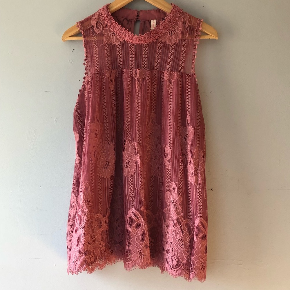 Blush lace sleeveless lace blouse.